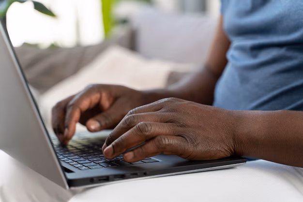 african-man-working-from-home_23-2149022791